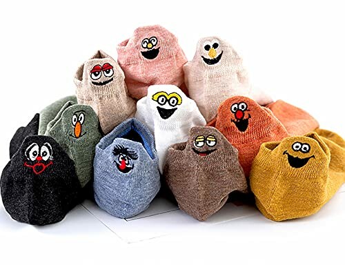 A collection of colorful sock monsters with various facial expressions.