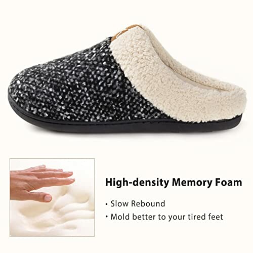 Black and white slipper with memory foam cushioning