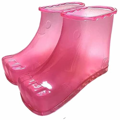 Pink translucent plastic rain boots for toddlers.