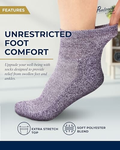 Purple sock on a foot with features like extra stretch top and soft polyester blend.